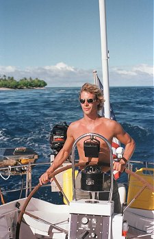 Bill at the helm through Tiputa Pass, Rangiroa