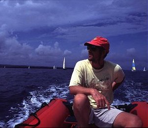 Sergei drives the dink in the Galapagos